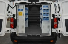 Shelves and plastic containers in a Jumpy