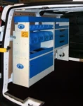 Shelving in a Ford Custom upfitted for industrial cleaners