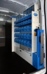 Shelving unit with bins on the left-hand side of the Daily Iveco