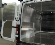 The left of the MAN TGE, with aluminium tread plate floor and bodywork liners and sheet aluminium roof liners