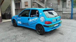 The Peugeot with the Syncro logo entered in the 34th Bassano Rally
